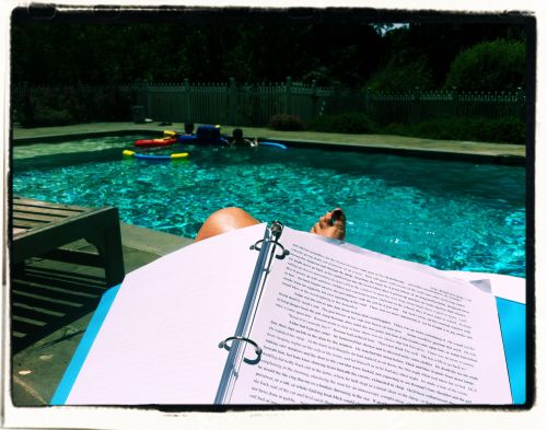 Editing manuscript for Wake, poolside, during summer months off. Can't argue with that. c. Elissa Field